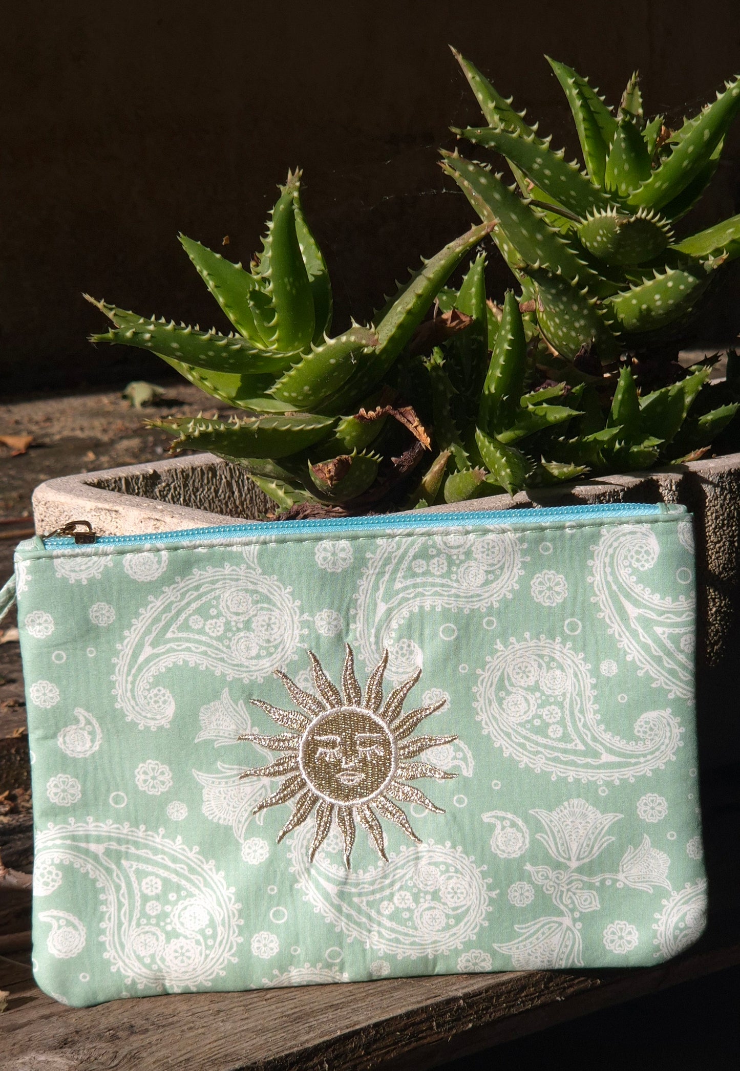 Pochette Soleil vert d’eau